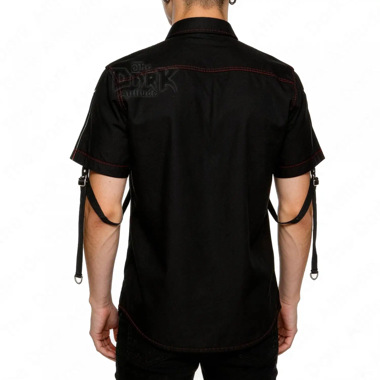 Black industrial shirt with red contrast stitching and hanging metal D-ring straps.